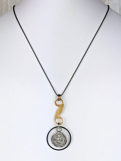 This little deity pendant embodies a higher frequency.  Tao is double-sided and cast in sterling silver with an overlay of rhodium to provide color stability. She's paired with a vintage brass S-shaped link plated with matte 18K gold.   Divinely inspired and effortlessly cool.