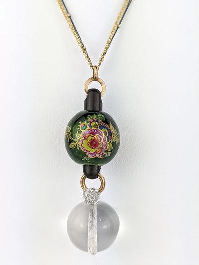 Rowan shines bright with a vintage 1940s Japanese handpainted wooden bead.  She's threaded over a link made of Victorian gutta-percha. Just to add more fantasy - a Bohemian crystal ball. This amulet is tethered to the past and lives in the now.